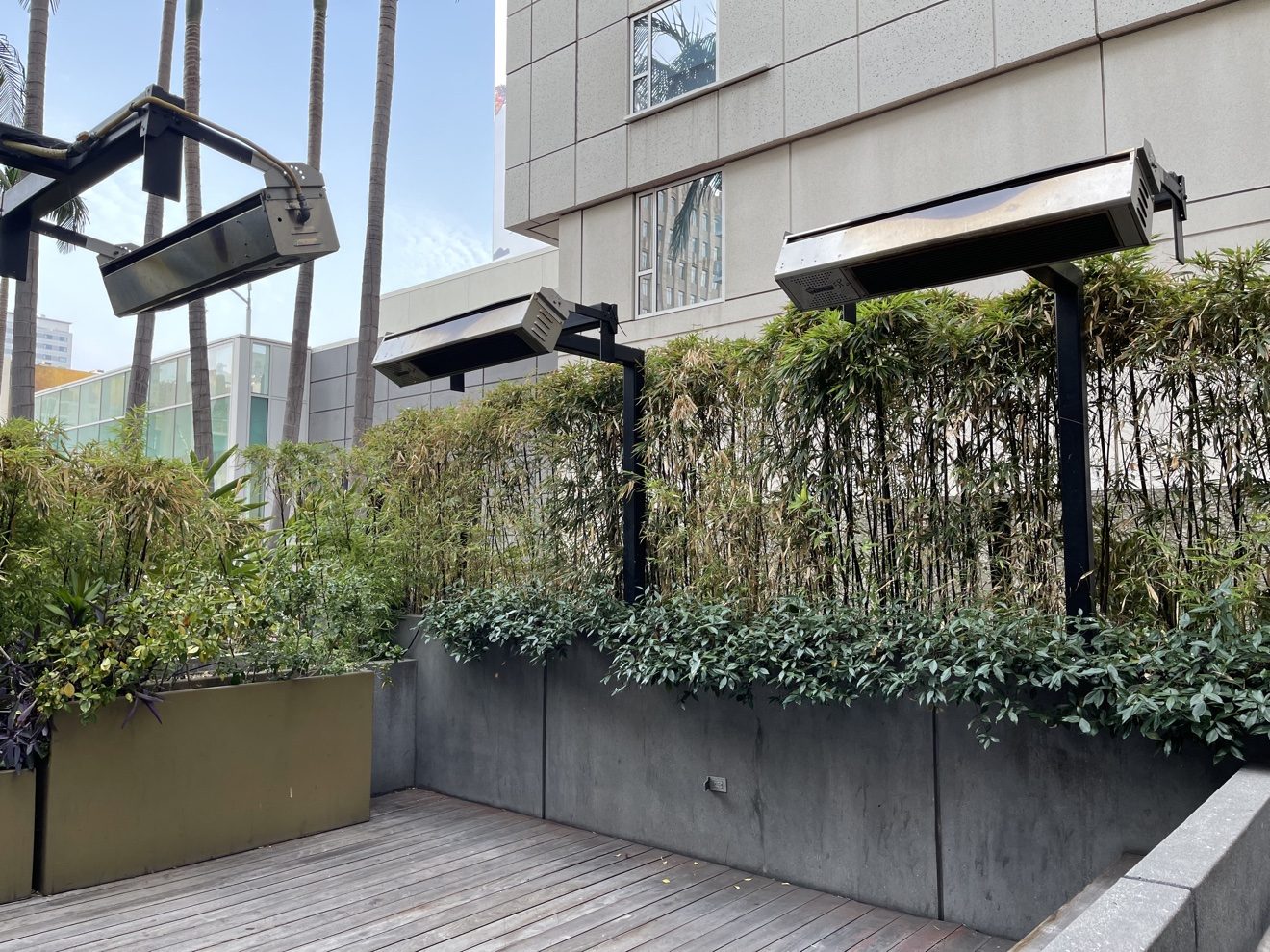 Sunpak wall-mounted heaters on a restaurant terrace